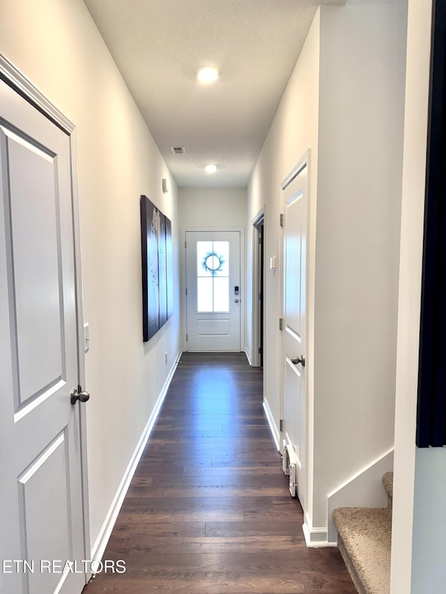 1013 Curly Top Ln, Knoxville, TN 37932 - doorway with dark wood-style floors, baseboards, and stairway