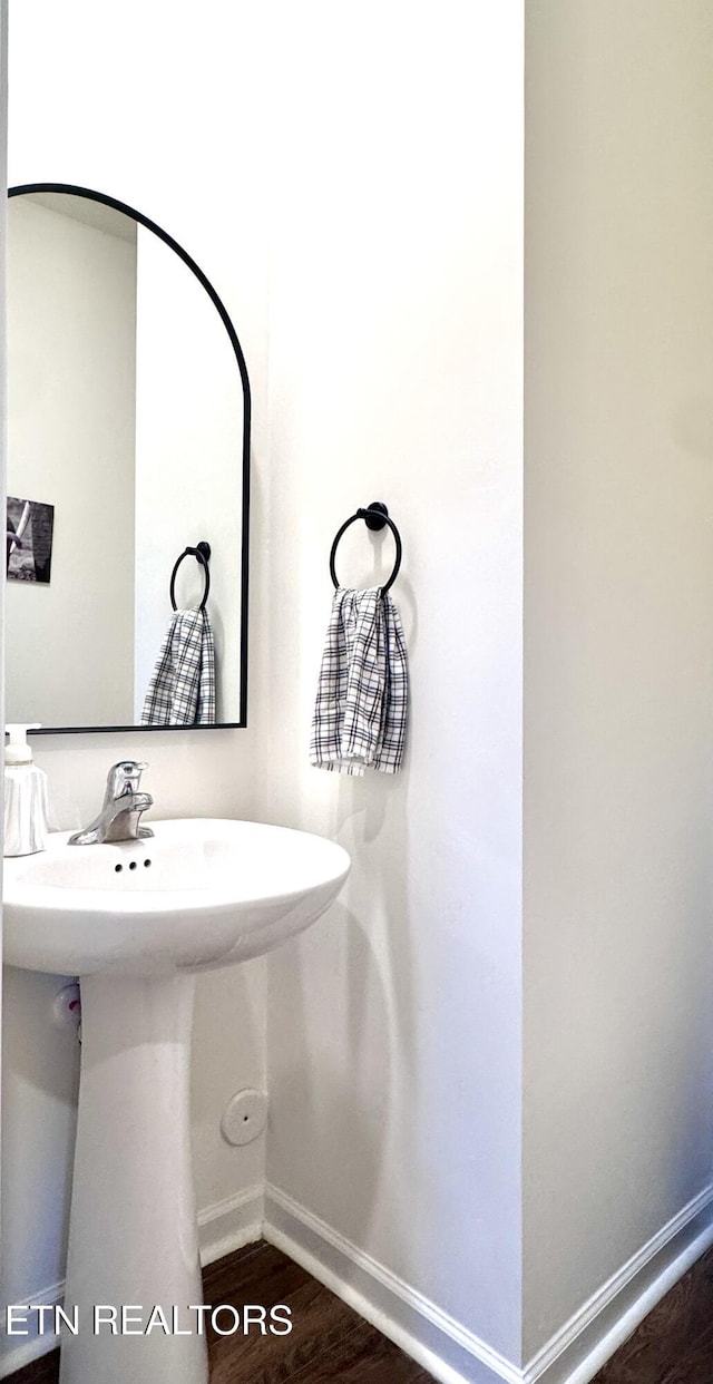1013 Curly Top Ln, Knoxville, TN 37932 - bathroom with baseboards, wood finished floors, and a sink