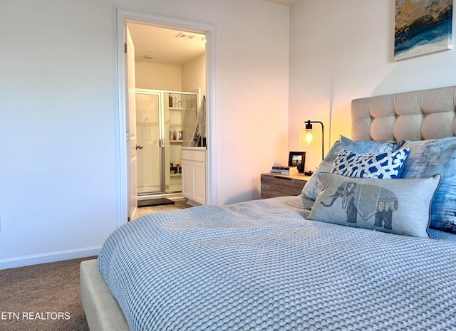 1013 Curly Top Ln, Knoxville, TN 37932 - carpeted bedroom featuring connected bathroom and baseboards