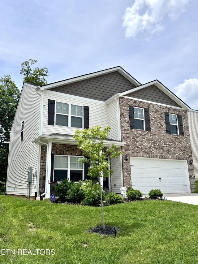 1013 Curly Top Ln, Knoxville, TN 37932 - view of front facade with a garage, a front lawn, and concrete driveway