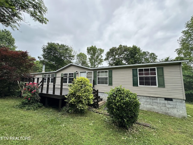214 Hickory Grove Rd, Madisonville, TN 37354 - view of home's exterior with a deck, a lawn, and crawl space