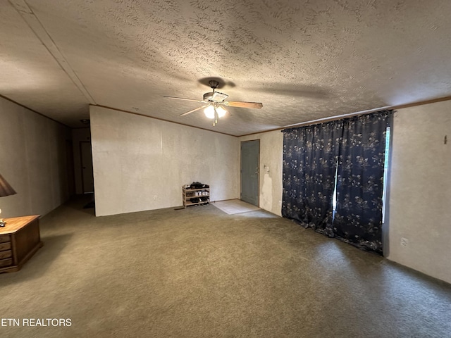 214 Hickory Grove Rd, Madisonville, TN 37354 - unfurnished living room with a ceiling fan, a textured ceiling, and carpet floors