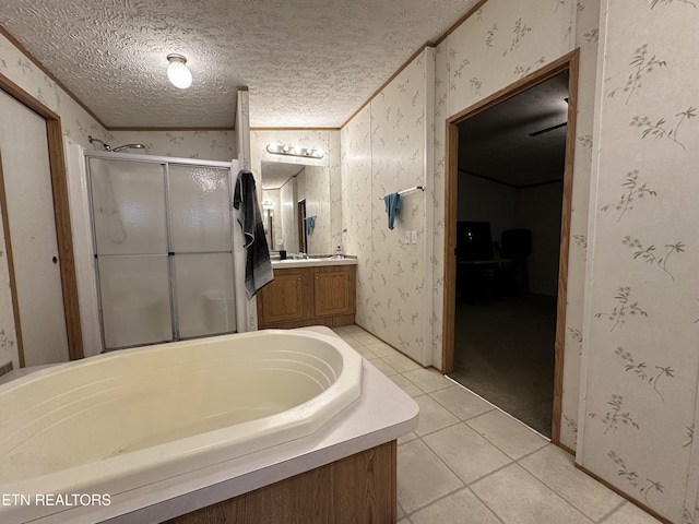 214 Hickory Grove Rd, Madisonville, TN 37354 - bathroom featuring wallpapered walls, a stall shower, vanity, a textured ceiling, and a bath