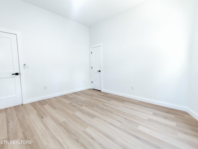 2714 E 5th Ave, Knoxville, TN 37914 - unfurnished room with light wood-type flooring and baseboards