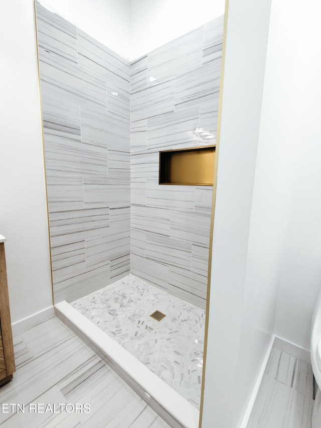 2714 E 5th Ave, Knoxville, TN 37914 - bathroom with a stall shower and baseboards