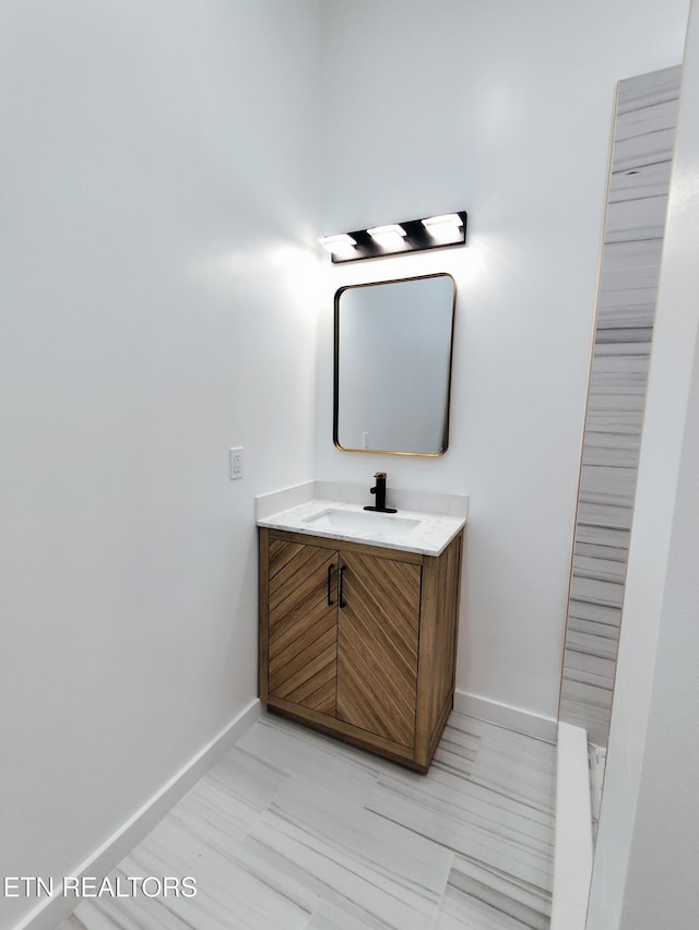 2714 E 5th Ave, Knoxville, TN 37914 - bathroom with baseboards and vanity
