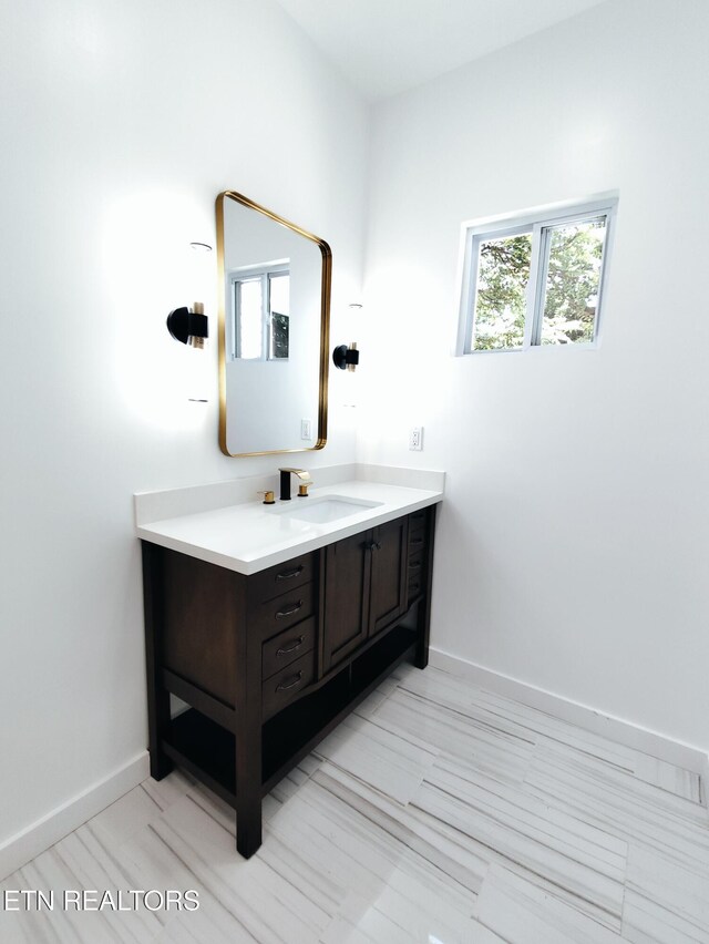 2714 E 5th Ave, Knoxville, TN 37914 - bathroom featuring vanity and baseboards