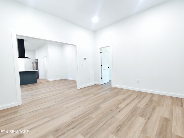 2714 E 5th Ave, Knoxville, TN 37914 - spare room with light wood-type flooring and baseboards