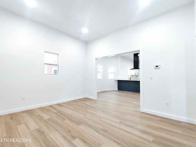 2714 E 5th Ave, Knoxville, TN 37914 - spare room with light wood-type flooring and baseboards