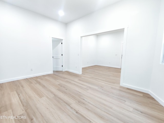 2714 E 5th Ave, Knoxville, TN 37914 - unfurnished room with light wood-type flooring and baseboards
