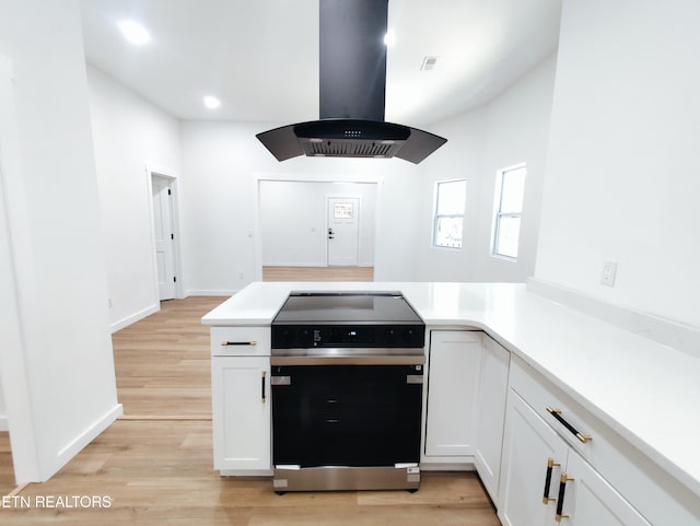 2714 E 5th Ave, Knoxville, TN 37914 - kitchen featuring black / electric stove, island exhaust hood, light wood finished floors, and recessed lighting