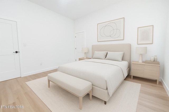 2714 E 5th Ave, Knoxville, TN 37914 - bedroom with light wood-type flooring and baseboards