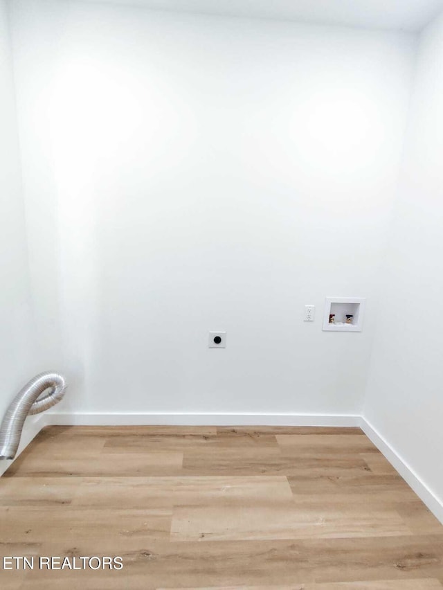 2714 E 5th Ave, Knoxville, TN 37914 - laundry room with hookup for an electric dryer, washer hookup, wood finished floors, and baseboards