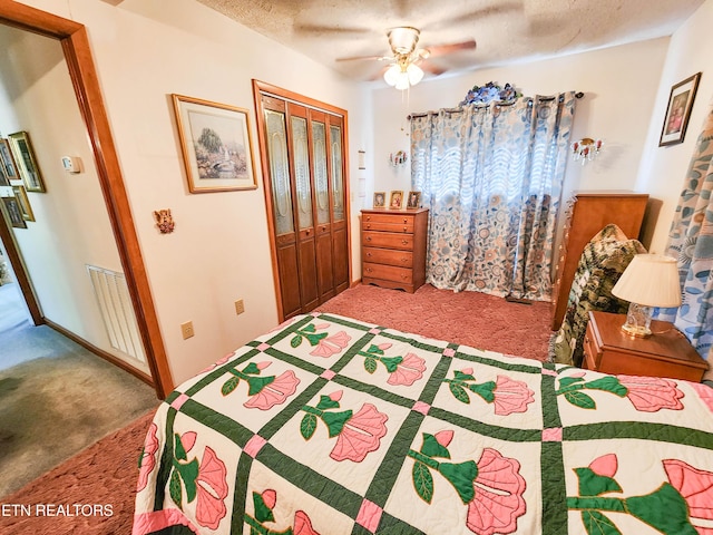 1711 Rocky Branch Rd, Rutledge, TN 37861 - bedroom with carpet, a closet, a ceiling fan, and a textured ceiling