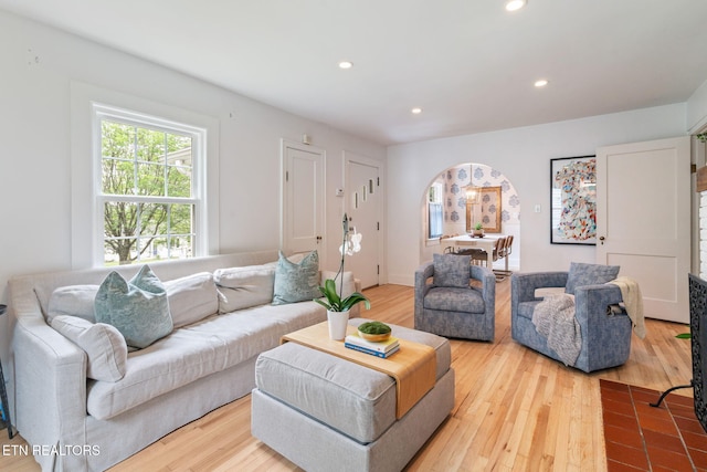 4051 Sutherland Ave, Knoxville, TN 37919 - living area featuring arched walkways, light wood-style floors, and recessed lighting