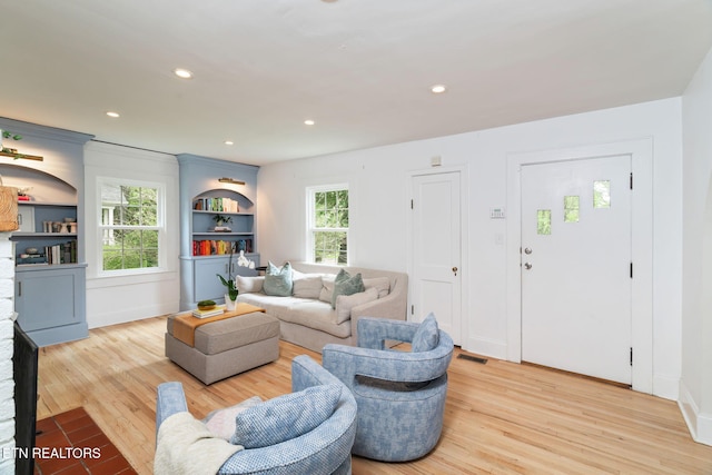 4051 Sutherland Ave, Knoxville, TN 37919 - living area with light wood-style floors, recessed lighting, baseboards, and built in shelves