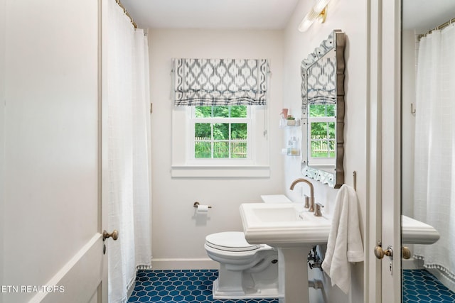4051 Sutherland Ave, Knoxville, TN 37919 - full bathroom with toilet, a shower with shower curtain, and tile patterned flooring