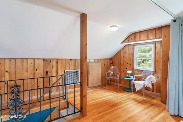 4051 Sutherland Ave, Knoxville, TN 37919 - living area with wood finished floors, wood walls, and vaulted ceiling