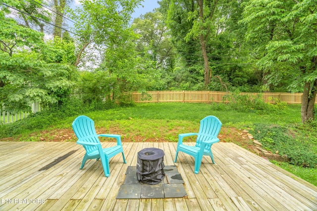 4051 Sutherland Ave, Knoxville, TN 37919 - wooden terrace with an outdoor fire pit and view of scattered trees