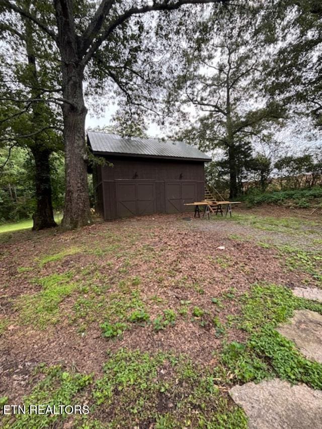 208 Charles Eaves Ln, Benton, TN 37307 - view of yard with an outbuilding and a pole building
