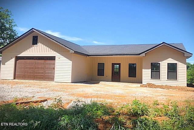 1146 Moodyville Loop, Byrdstown, TN 38549 - view of front of property with a garage and driveway