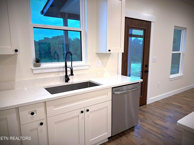 1146 Moodyville Loop, Byrdstown, TN 38549 - kitchen with dishwasher, white cabinetry, dark wood-style flooring, and light stone counters