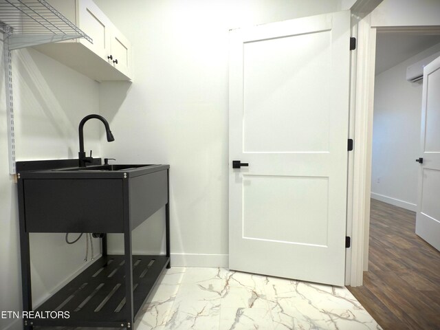 1146 Moodyville Loop, Byrdstown, TN 38549 - washroom featuring cabinet space and light marble finish flooring
