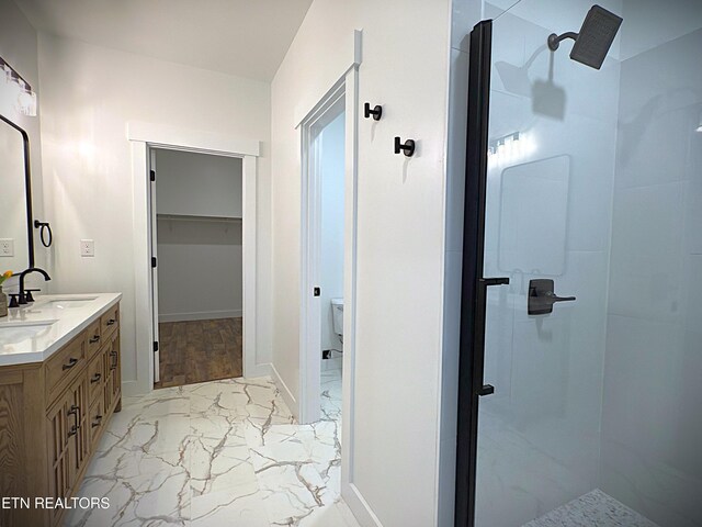1146 Moodyville Loop, Byrdstown, TN 38549 - bathroom with marble finish floors, a shower stall, double vanity, and a walk in closet