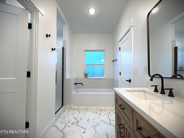 1146 Moodyville Loop, Byrdstown, TN 38549 - full bathroom with vanity, a garden tub, a stall shower, and marble finish flooring