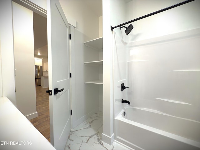 1146 Moodyville Loop, Byrdstown, TN 38549 - full bathroom with shower / bathtub combination and marble finish flooring