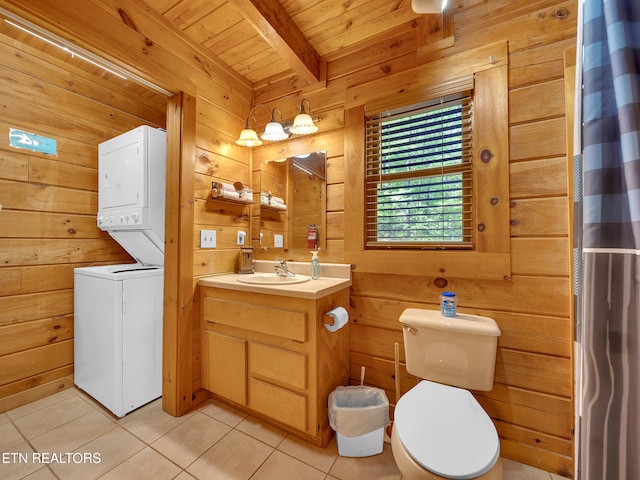 full bath with stacked washer and clothes dryer, wooden ceiling with exposed beams, tile patterned floors, wood walls, and toilet