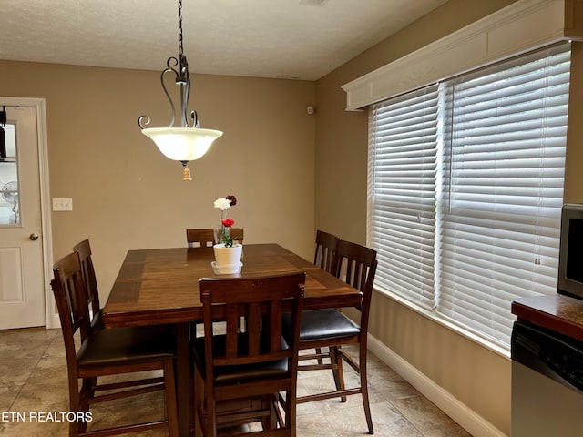 1018 Southwind Cir, Dandridge, TN 37725 - dining space featuring baseboards and light tile patterned flooring