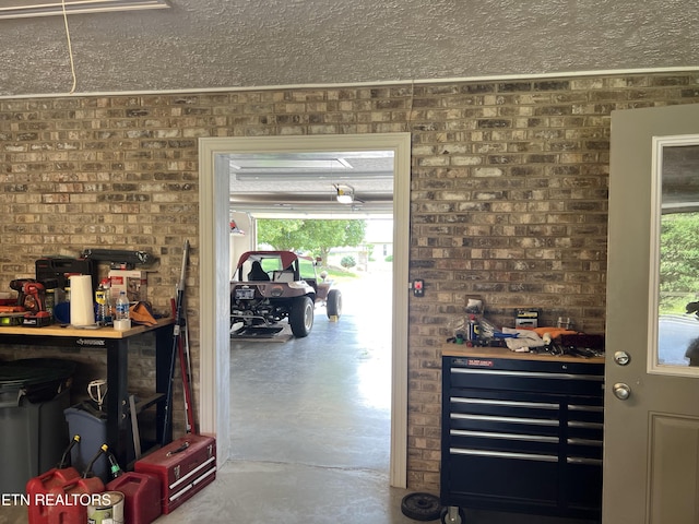 1018 Southwind Cir, Dandridge, TN 37725 - bar featuring concrete flooring, a textured ceiling, and plenty of natural light