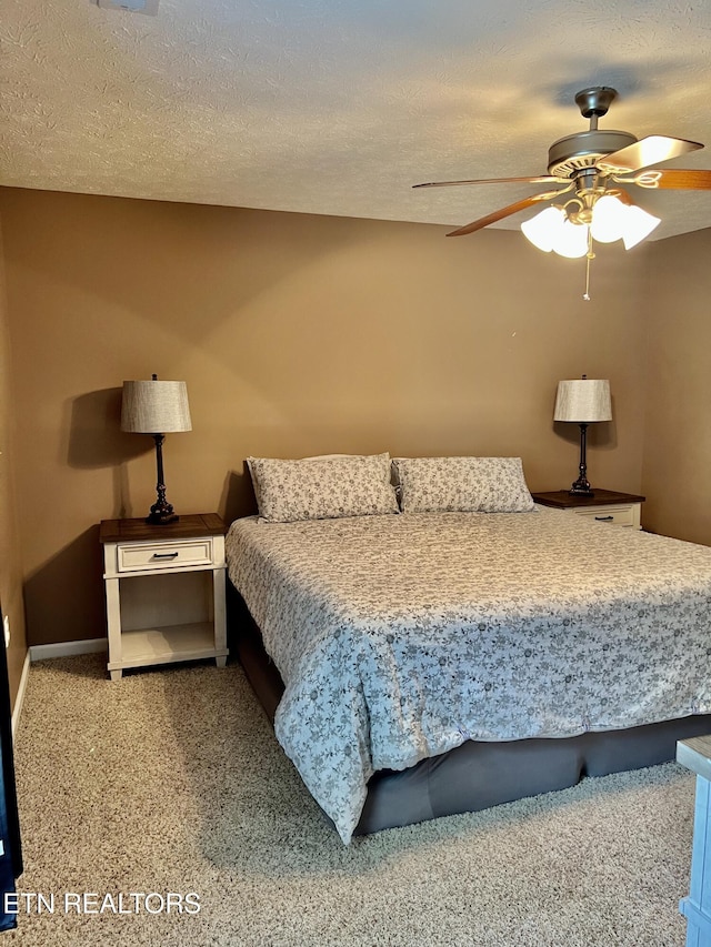 1018 Southwind Cir, Dandridge, TN 37725 - bedroom featuring carpet flooring, a ceiling fan, and a textured ceiling