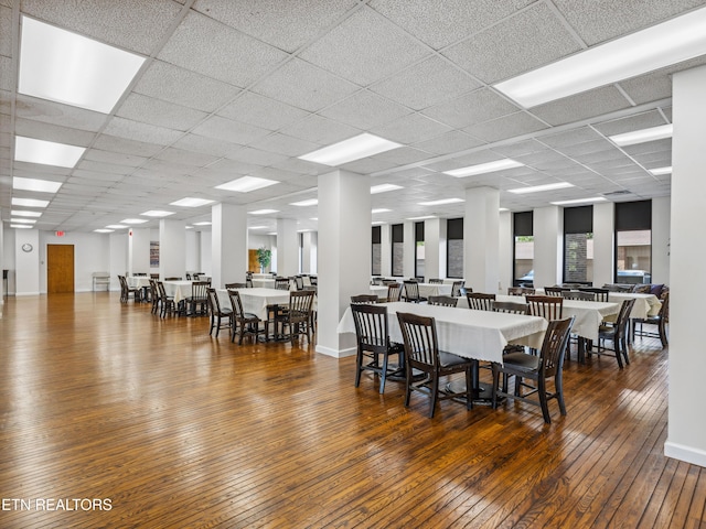 203 Regal Tower, Maryville, TN 37804 - dining space with hardwood / wood-style flooring, a paneled ceiling, and baseboards