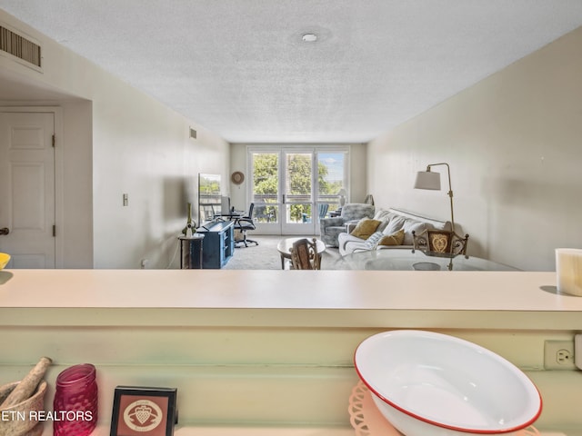 203 Regal Tower, Maryville, TN 37804 - kitchen with a textured ceiling and open floor plan