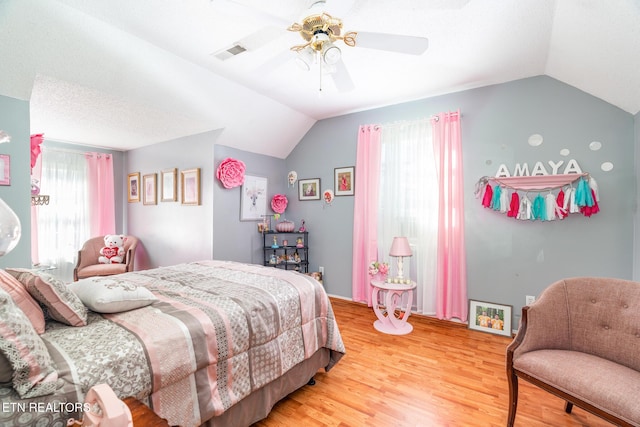 410 Railey Ln, Huntsville, TN 37756 - bedroom with lofted ceiling, light wood-style flooring, and a ceiling fan