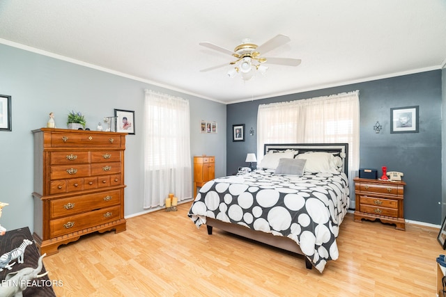 410 Railey Ln, Huntsville, TN 37756 - bedroom with light wood-style flooring, ornamental molding, baseboards, and a ceiling fan