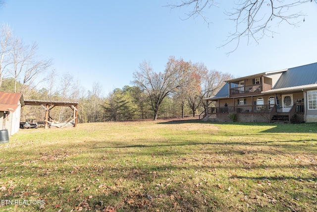 410 Railey Ln, Huntsville, TN 37756 - view of grassy yard featuring a balcony