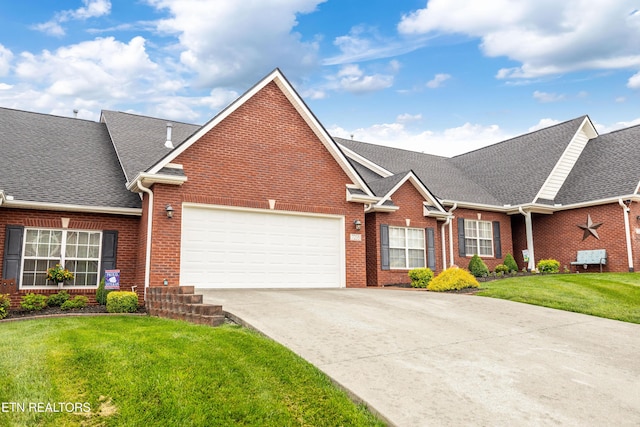 7235 Alysha Vineyard Way, Knoxville, TN 37931 - traditional-style house with a garage, brick siding, and a shingled roof