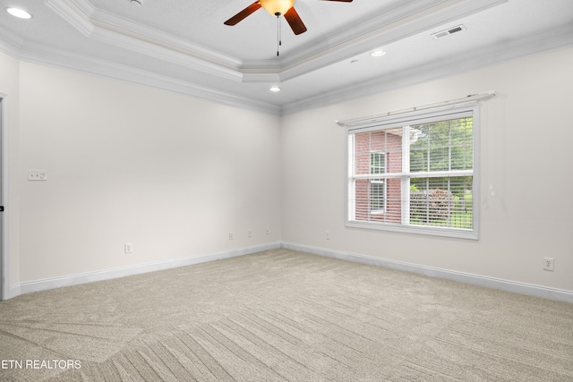7235 Alysha Vineyard Way, Knoxville, TN 37931 - spare room with light colored carpet, a ceiling fan, ornamental molding, a tray ceiling, and recessed lighting