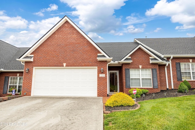 7235 Alysha Vineyard Way, Knoxville, TN 37931 - traditional-style house with brick siding, driveway, and an attached garage
