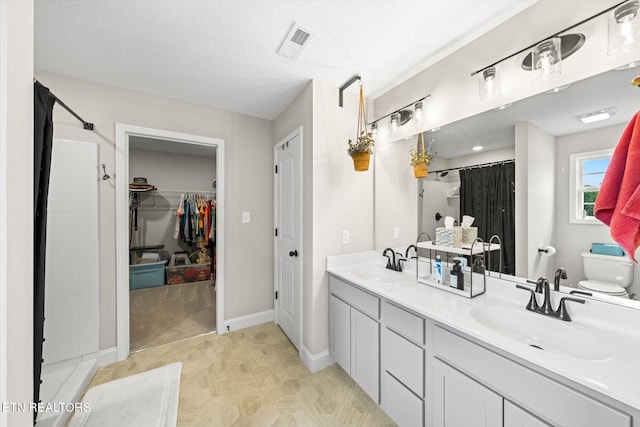 2516 Lemon Berry St, Knoxville, TN 37932 - full bath with toilet, double vanity, baseboards, a shower, and a spacious closet