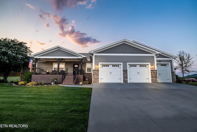 119 Pointe Summit Dr, Greenback, TN 37742 - craftsman inspired home featuring a front lawn, a porch, an attached garage, and driveway