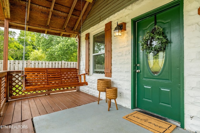 6944 Berry Ln, Knoxville, TN 37914 - doorway to property featuring a porch and stone siding