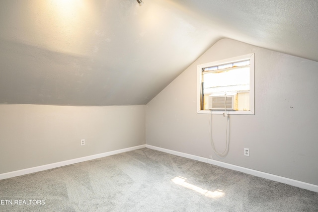 6944 Berry Ln, Knoxville, TN 37914 - bonus room featuring carpet floors, lofted ceiling, baseboards, and cooling unit