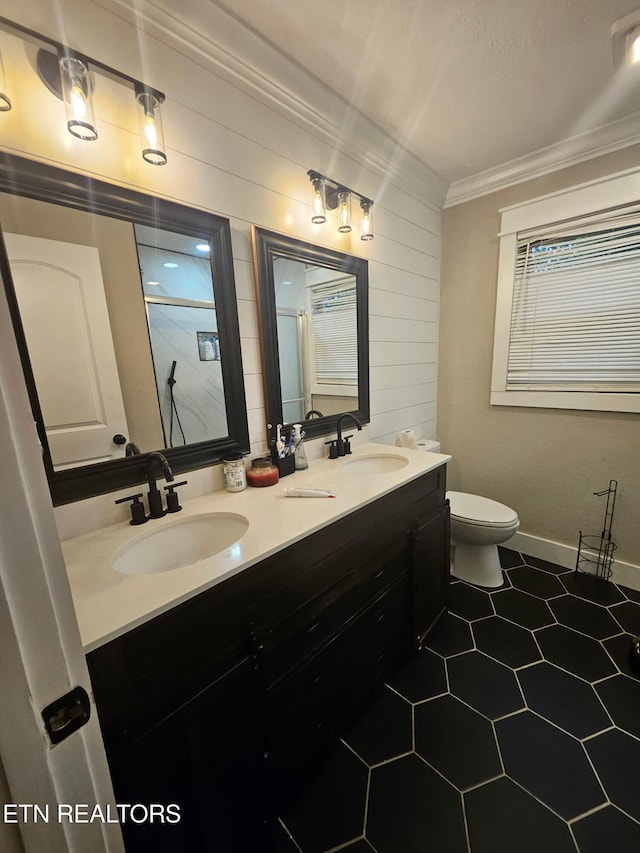 828 Noragate Rd, Knoxville, TN 37919 - full bath featuring crown molding, double vanity, a shower with door, toilet, and wooden walls
