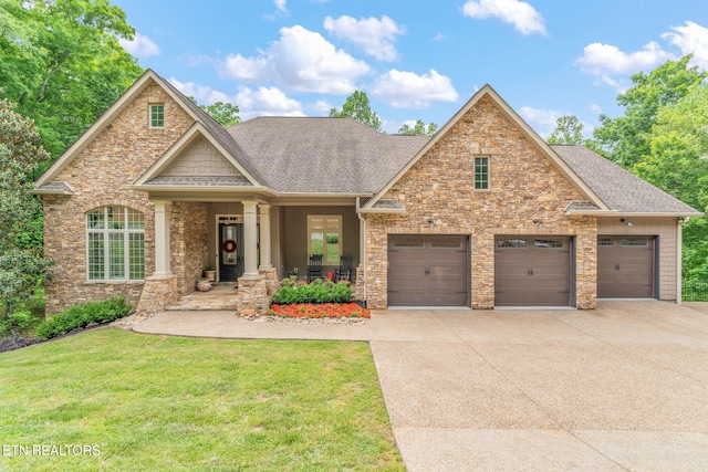 111 Winchester Cir, Oak Ridge, TN 37830 - craftsman inspired home with roof with shingles, concrete driveway, a front lawn, and a garage