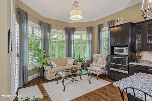 111 Winchester Cir, Oak Ridge, TN 37830 - living room featuring healthy amount of natural light and dark wood finished floors