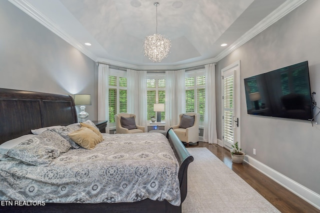 111 Winchester Cir, Oak Ridge, TN 37830 - bedroom with wood finished floors, crown molding, a chandelier, baseboards, and a raised ceiling